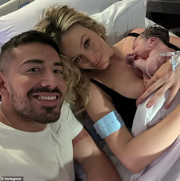 Simone Holtznagel (right) welcomed her first child with her personal trainer boyfriend, Jono Castano (left)