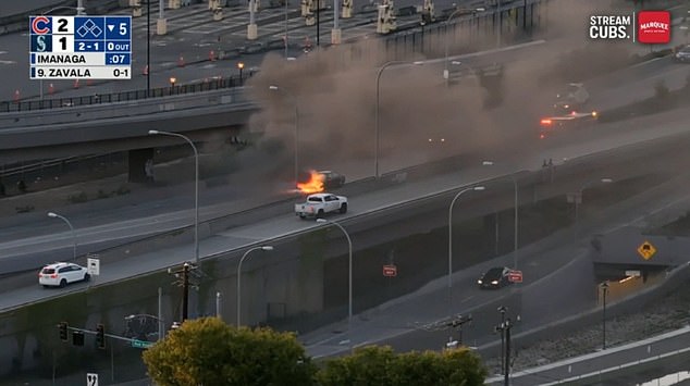 Car engulfed in flames near Seattle Mariners' T-Mobile Park causing smoke haze