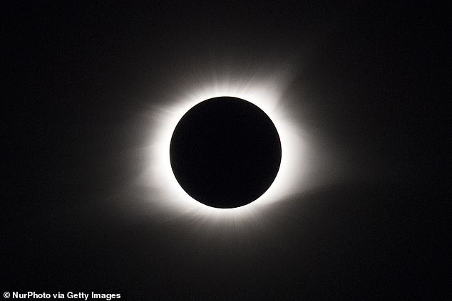 The solar eclipse (pictured) will stretch 115 miles from Maine to Texas on Monday, but astronomers say the path of totality has shifted 2,000 feet.