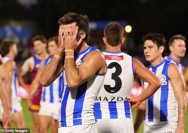 Hood received waves of abusive messages from fans when the Kangaroos lost four straight games this AFL season (pictured, Luke McDonald after losing to the Lions by 70 points)
