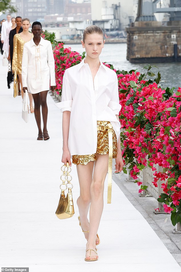 Summer Sparkle: Michael Kors Sent Models Down the Catwalk in Shiny Gold Mini Skirts and Matching Handbags
