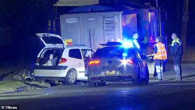 A woman and child are fighting for their lives after the car they were traveling in crashed into a parked truck in St Marys, western Sydney.