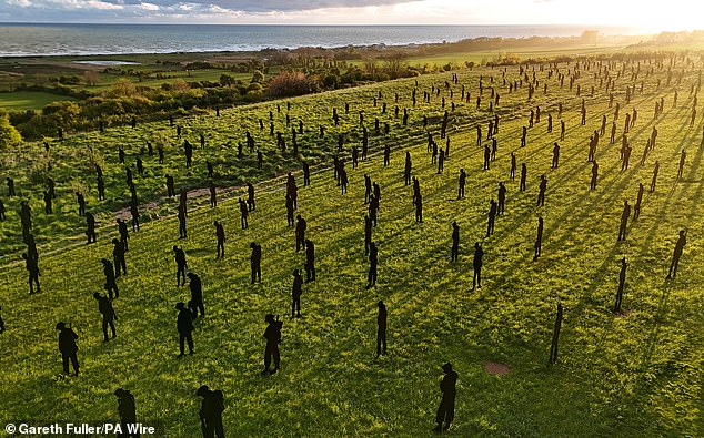 The Standing with Giants silhouettes are part of the For Your Tomorrow installation at the British Normandy Memorial in Ver-Sur-Mer, France.