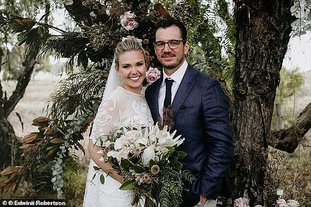 The couple is pictured on their wedding day in 2018.