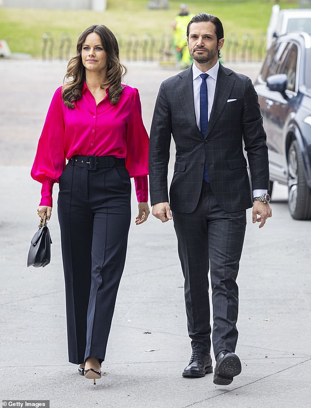 Sweden's Princess Sofia looked stunning in pink as her husband Prince Carl Philip accompanied her to attend a disability event.