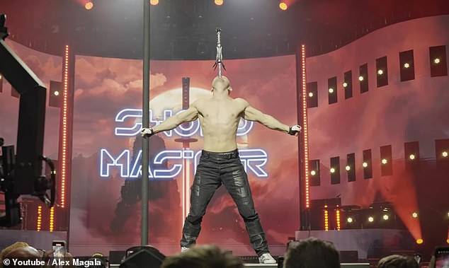 Magala performed his daredevil act on stage at the Strongest Men Conference on April 11.