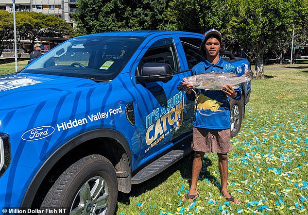 Keegan Payne (pictured) thought the 67cm barramundi he picked up from the Katherine River on Sunday would make a good meal for his family.