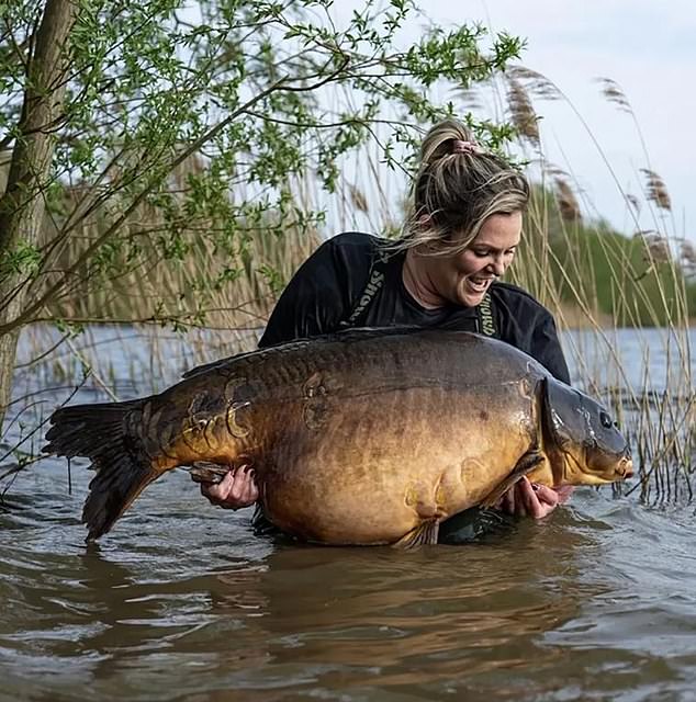 Naomi Turner (pictured) broke a new British record by catching a huge 72lb 12oz carp at Holme Fen Fishery in Cambridgeshire.