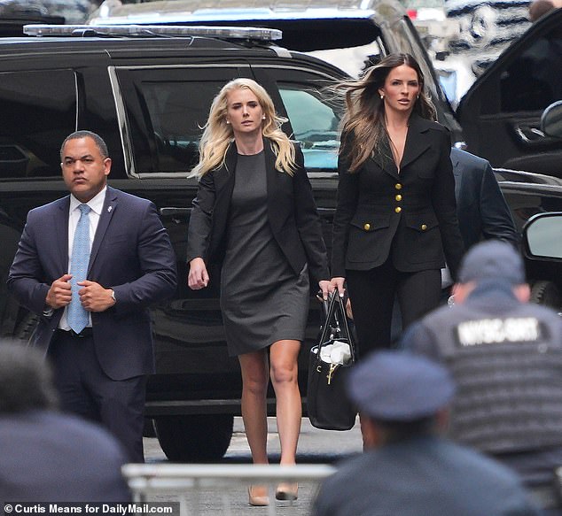 Natalie Harp (left) arrived at Manhattan Criminal Court on Tuesday with Margo Martin (right), the former president's fellow communications assistant.
