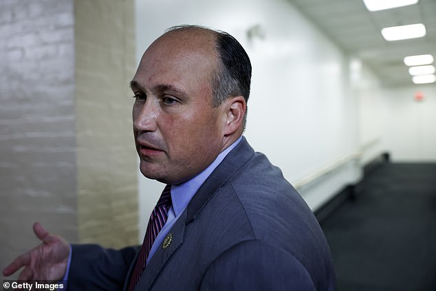 Rep. Nicholas Langworthy (R-NY) speaks to reporters as he walks to the House Republican Conference meeting at the U.S. Capitol on July 18, 2023.