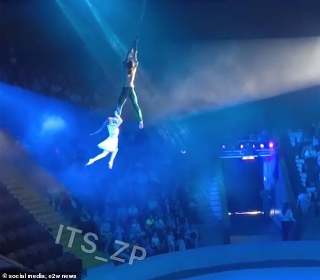 Two child acrobats were performing an aerial act at a Ukrainian circus before the boy 