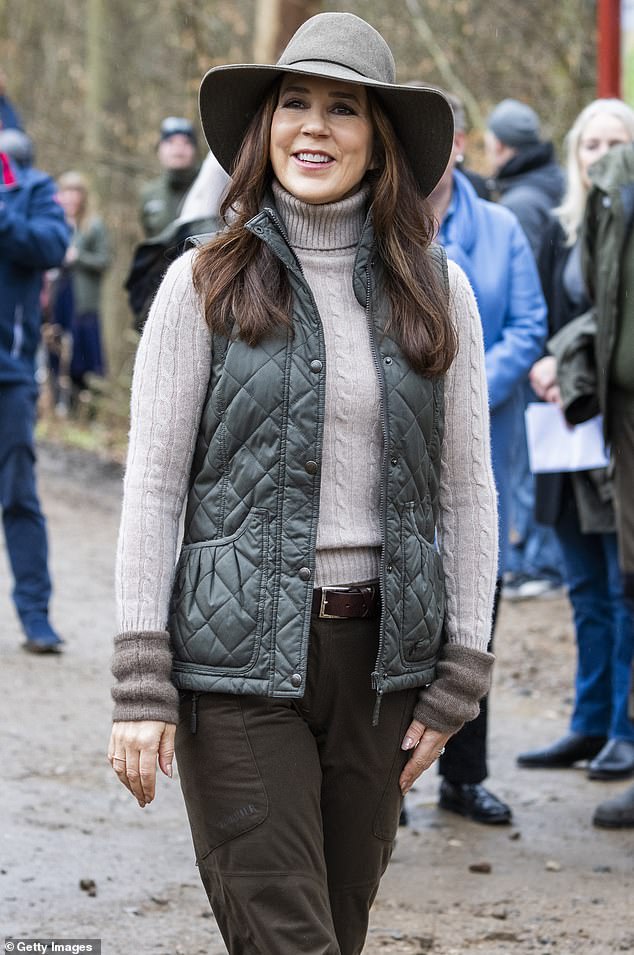 Queen Mary of Denmark was well prepared for the cold Danish weather as she opened a Deer Park in Dyrehaven, just north of Copenhagen, on Sunday 7 April.