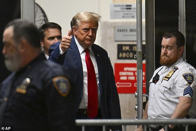 Trump gave a thumbs up to reporters as he left the courtroom during a break in the proceedings.