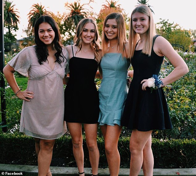 The 23-year-old is pictured second from left during a day out with her friends.