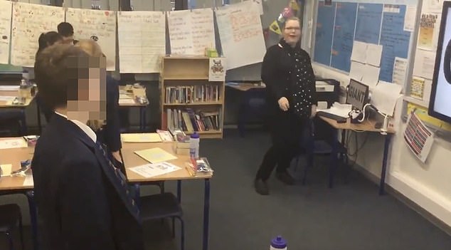The primary school teacher is seen dancing without a care in the world in front of a class at Eastfield Academy in Northampton just months before killing her boyfriend.