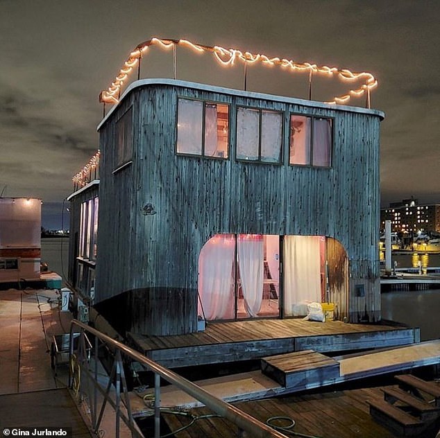 This houseboat costs $110,000 and has four bedrooms and three bathrooms.