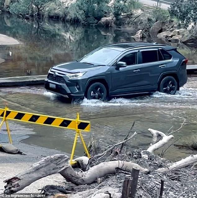 Australians are flocking to hybrid cars over fully electric vehicles despite Labor's upcoming emissions crackdown (pictured, a hybrid-powered Toyota RAV4).
