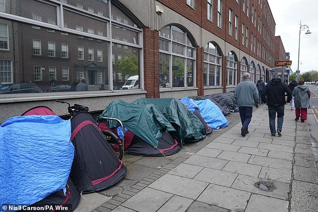 Tents housing asylum seekers in Dublin yesterday.  The Irish government has complained that the figures are determined by the UK's plans for Rwanda.
