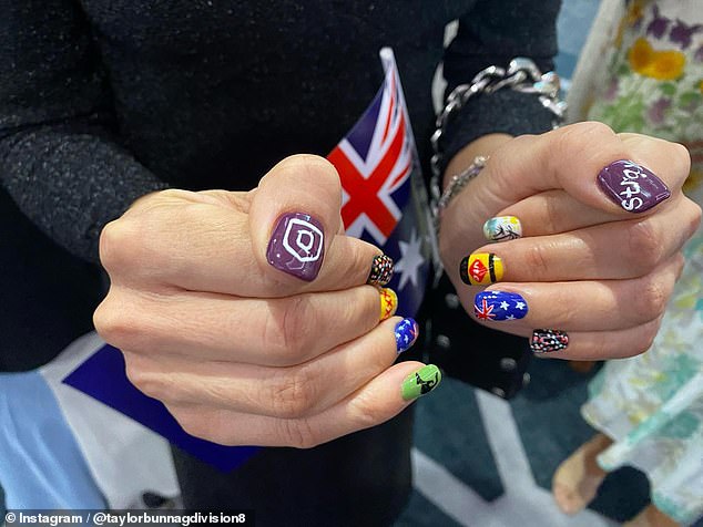 For the exciting occasion, the immigrant had her nails done with various Australian symbols and motifs, from Vegemite to the State of Origin to a sunny beach.