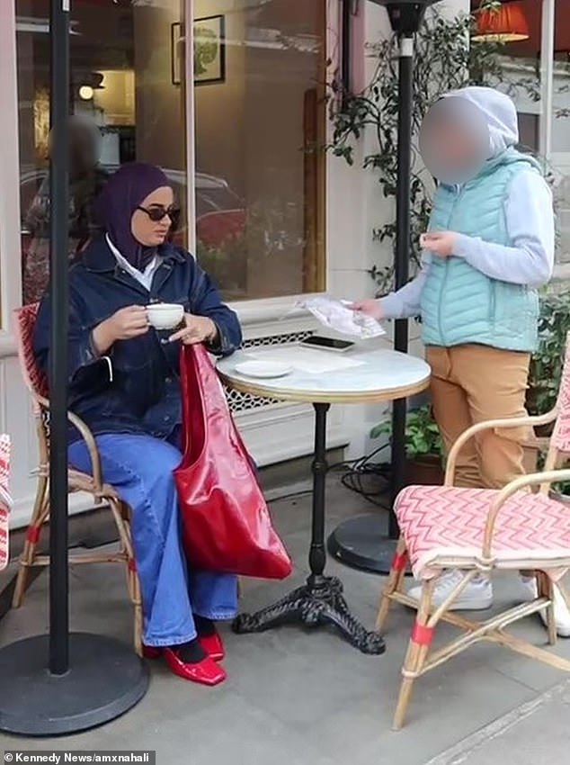 Aminah Ali (pictured), 25, was filming a video with a friend outside a restaurant in London earlier this month when a woman arrived 
