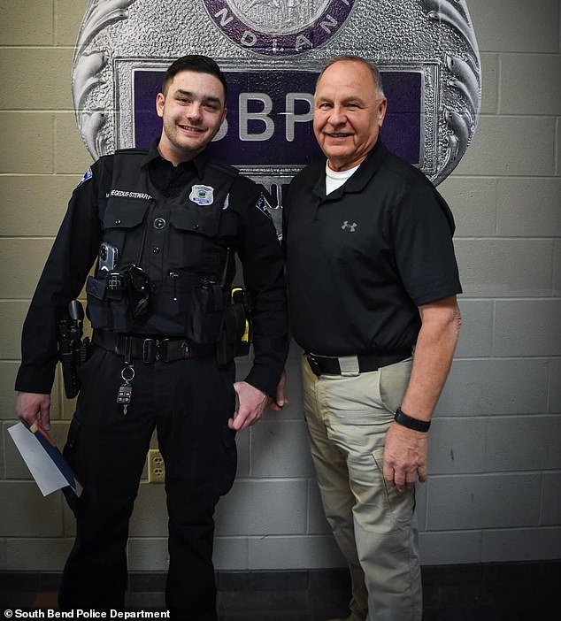 The candid photo op took place at the South Bend Police Department in Indiana late last month and featured retired officer Gene Eyster, who handled the case 24 years ago.  The other principle was none other than SBP officer Matthew Hegedus-Stewart.