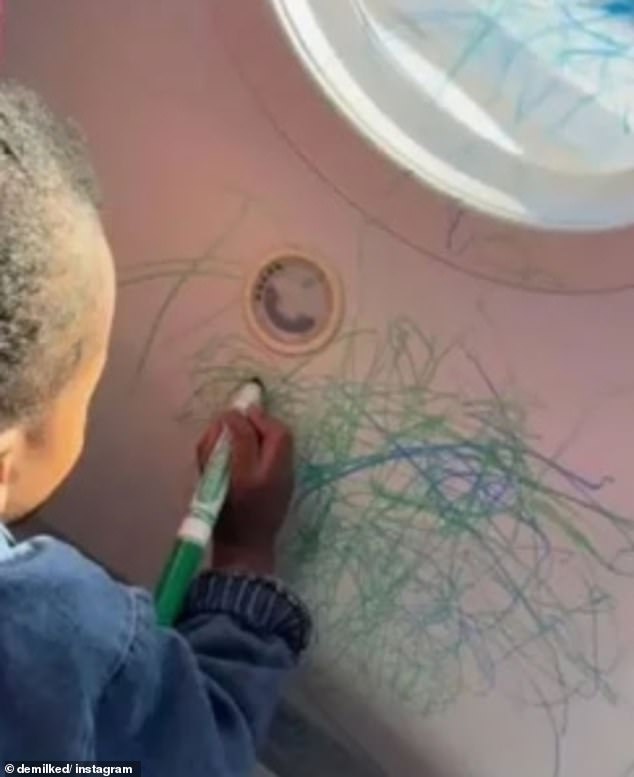 This is not a coloring book!  A father let his young son draw all over the plane during a flight, much to the chagrin of the cabin crew.