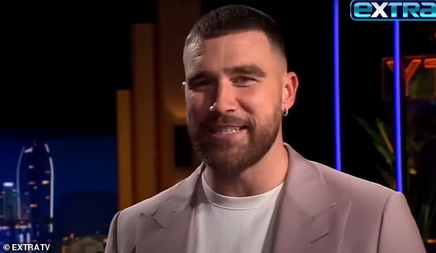 Travis Kelce believes his upbringing prepared him for life in the spotlight with Taylor Swift.