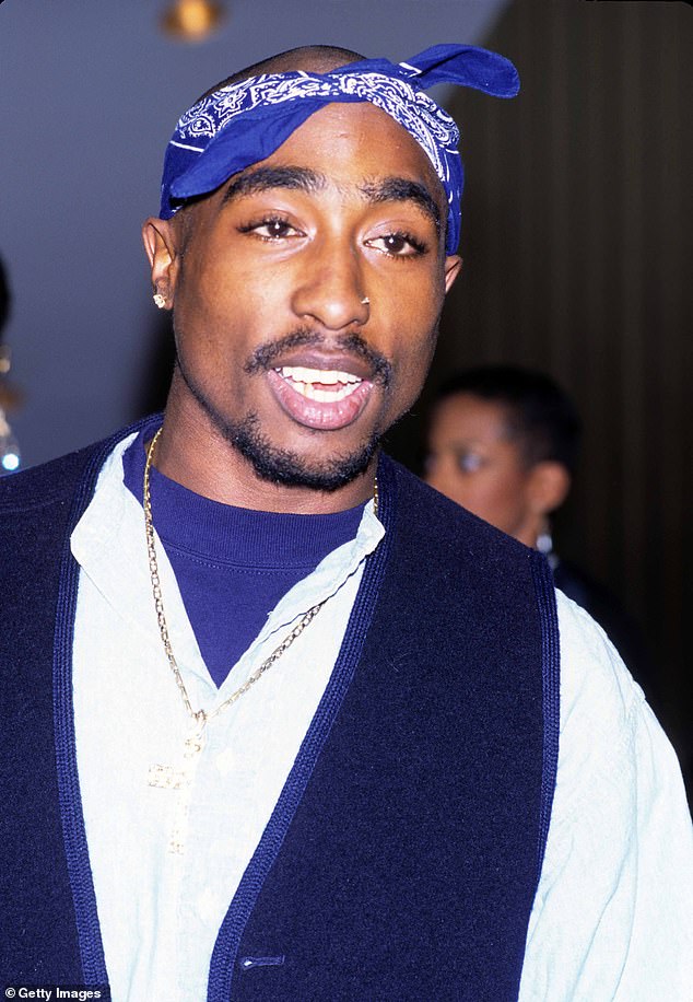 The song uses artificial intelligence to recreate the voices of Tupac and Snoop Dogg;  Tupac photographed in 1996
