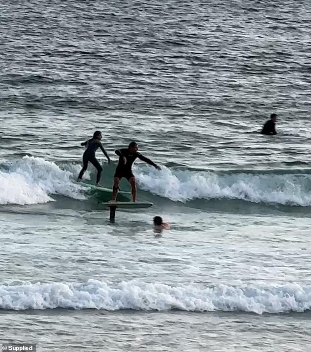 A hydrofoil was confronted at Sydney's Bondi Beach, where the sport is banned.
