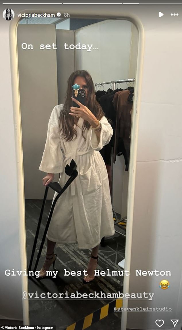Victoria Beckham posed with her crutches while preparing for a photo shoot for her beauty brand on Tuesday as she continues to recover from her broken foot.