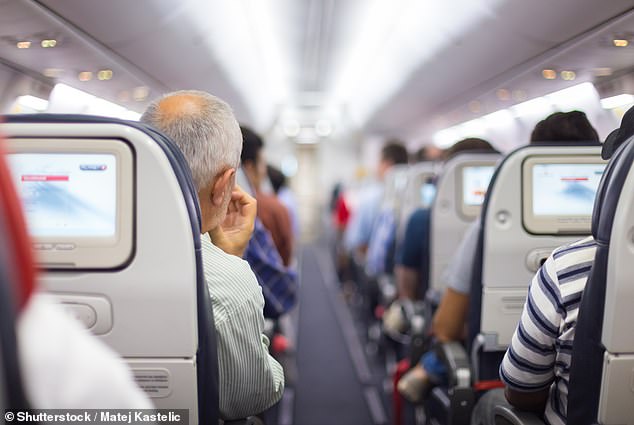 A strange photo of an inconsiderate passenger on a plane has gone viral