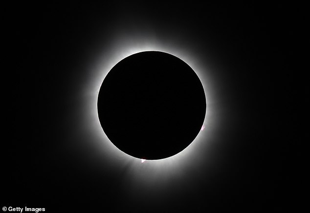 A total solar eclipse is seen from Houlton, Maine, on Monday, April 8, a rare cosmic phenomenon that swept across the United States and parts of Mexico.
