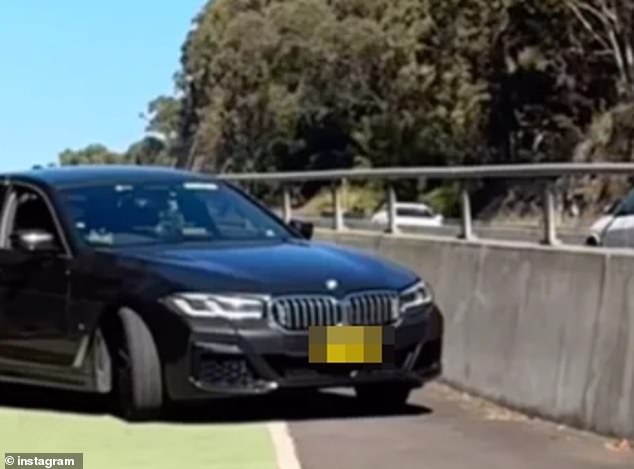 Video footage showed a Highway Patrol vehicle parked behind a barrier along the Alfords Point Bridge in the Sutherland Shire, south of Sydney.