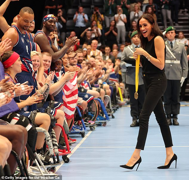 The duchess wore sky-high stilettos as she presented medals to the winning wheelchair basketball team, the United States, at the Invictus Games in Frankfurt last year.