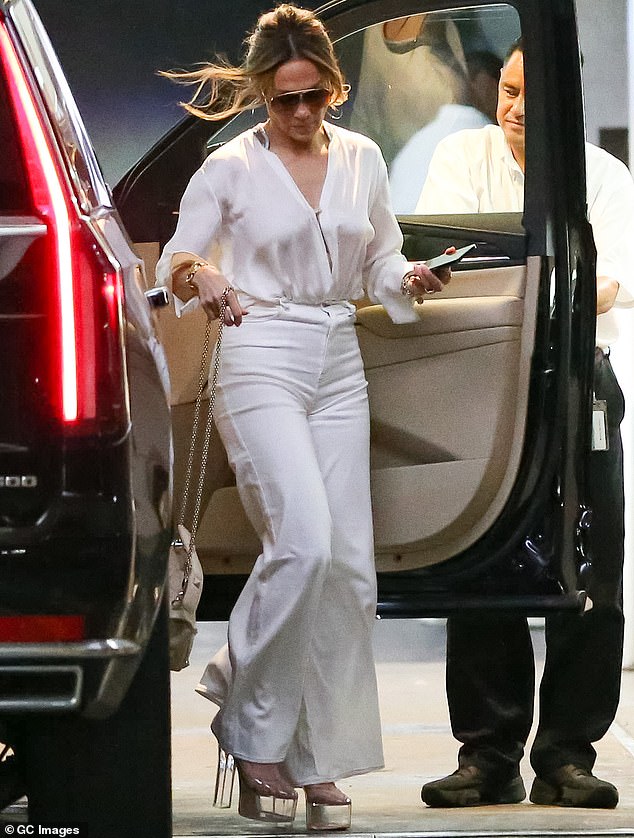 If you're a regular woman with a dog, then white jeans are last on your list, but megastars like Jennifer Lopez, above, can probably get away with it.