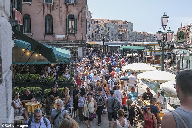 Venice (pictured) has introduced a new measure requiring all day-trippers to pay £5 simply for the privilege of being there.