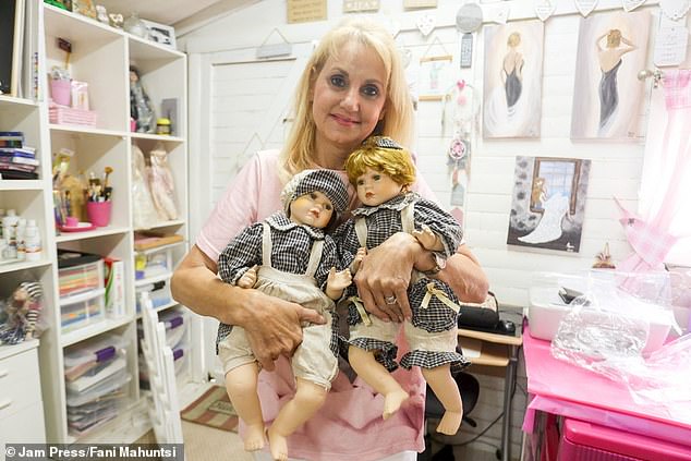 Lynn Emdin (pictured), 59, is the proud owner of 1,000 porcelain dolls, which she houses in a garden shed known as 'She Shed'.