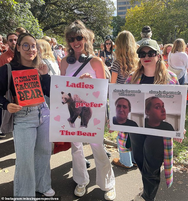 Women attending a demonstration in Sydney calling for an end to gender-based violence held signs that read 
