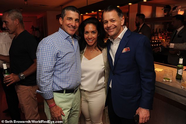 Catherine Tusiani, 50, died Wednesday after her car was crushed by a tree on Route 128 in Armonk.  Her husband, Michael J. Tusiani (right), is the Yankees' senior vice president of partnerships.