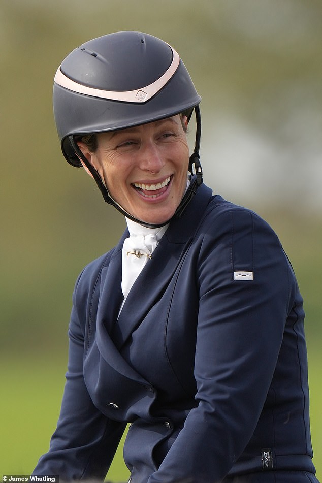 Zara Tindall was back on the saddle today as she braved the gloomy weather to compete on day two of the Burnham Market Horse Trials in Norfolk.