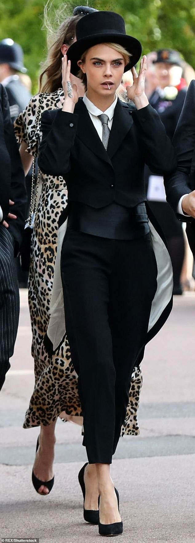 Cara Delevingne, a guest at Princess Eugenie's nuptials in 2018, completely upstaged the royal bride by appearing in a top hat and tails.