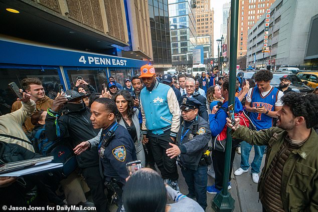 Carmelo Anthony was surrounded by fans as he entered Madison Square Garden for the game.