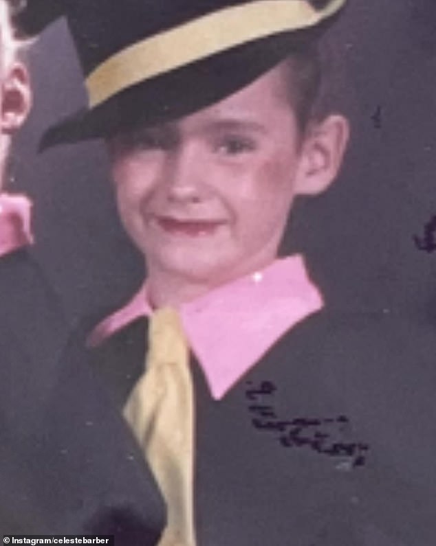 The second snap shows Celeste wearing a stylish ensemble of a black jacket paired with a pink shirt and a stylish yellow tie, topped off with a jaunty hat that screams personality.