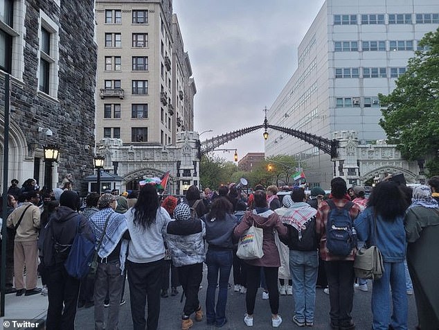 Pro-Palestinian protesters stand outside CCNY at 139th Street and Amsterdam Avenue