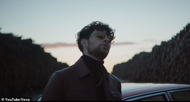 Tom Grennan pictured in his music video for the song Sober
