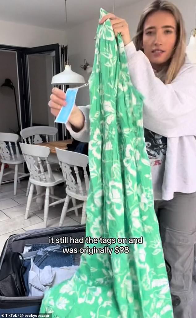 Next, Becky found a stunning green floral maxi dress with the tags still on, which sold for around £78.