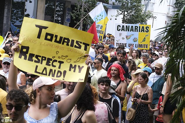 Thousands of residents protested in Tenerife, Canary Islands, on April 20 to demand the government temporarily limit tourist arrivals.