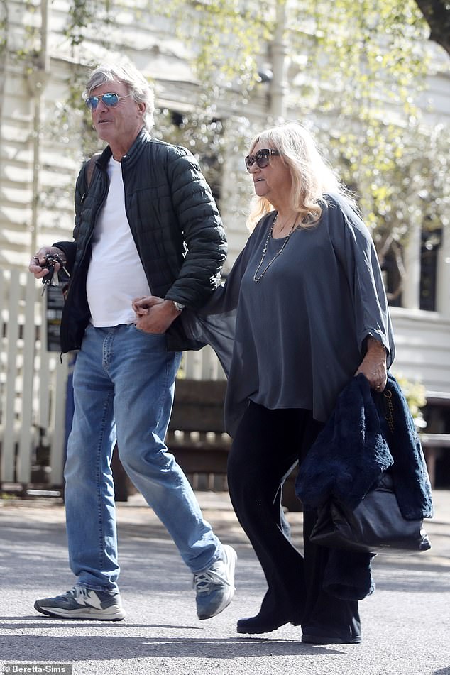 The TV personality, 75, walked hand in hand with her husband of 37 years as they arrived together at the north London pub on Monday afternoon.