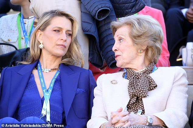 The pair were pictured chatting as they watched the historic event unfold in the world's first modern Olympic stadium.