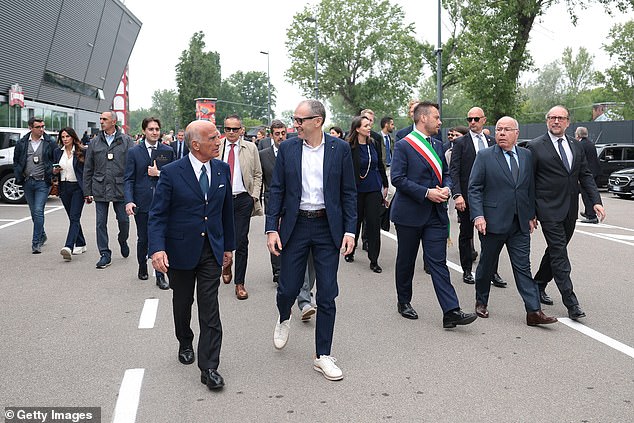 F1 CEO Stefano Domenicali (centre) was accompanied by politicians from Italy, Austria and Brazil.